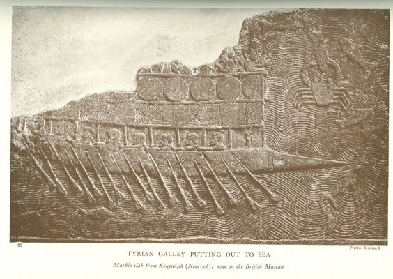 TYRIAN GALLEY PUTTING OUT TO SEA<br> <i>Marble slab from Kouyunjik (Nineveh): now in the British Museum</i>.<br> Photo. Mansell